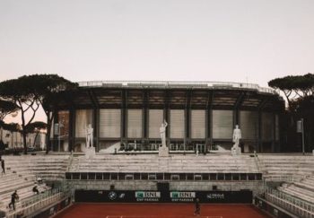Aerial view of a tennis match at Foro Italico stadium in Rome, Italy.
