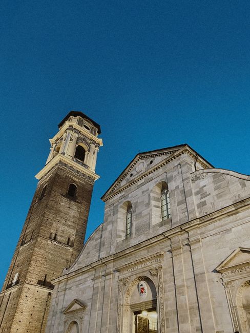 Beautiful architectural shot of Turin Cathedral and its bell tower at dusk in Torino, Italy.
