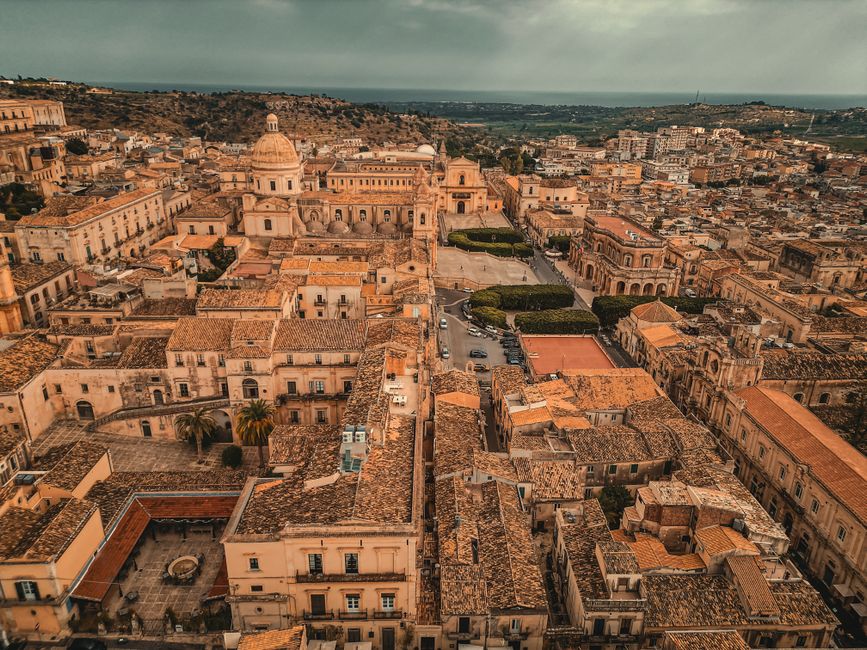 Explore the breathtaking aerial view of Noto's historic architecture in Sicily. A testament to Baroque beauty.