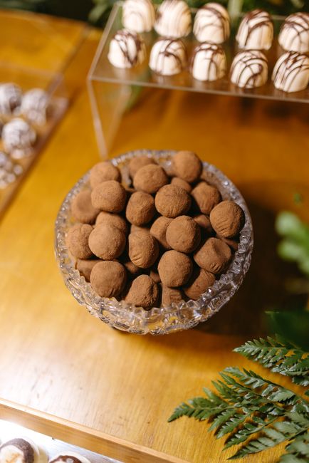 A beautiful display of chocolate truffles in a crystal bowl, perfect for indulgent desserts.