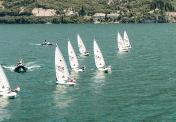 Aerial view of sailboats competing in a race on Lake Garda, Italy.