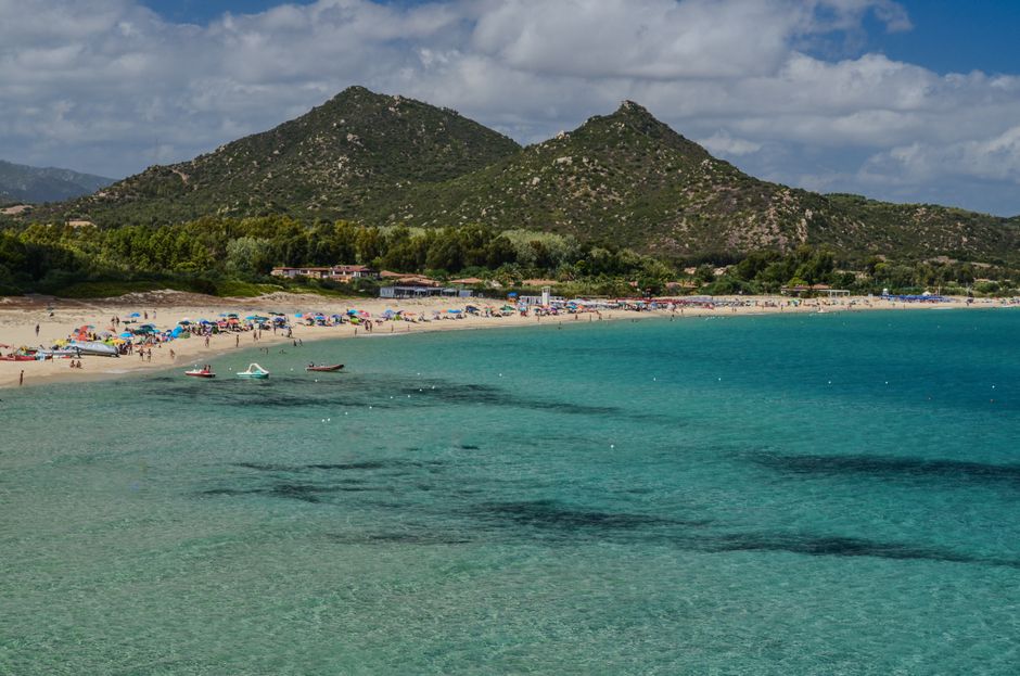 Beautiful beach in Sardinia, Italy with turquoise waters and vibrant scenery perfect for a summer holiday.