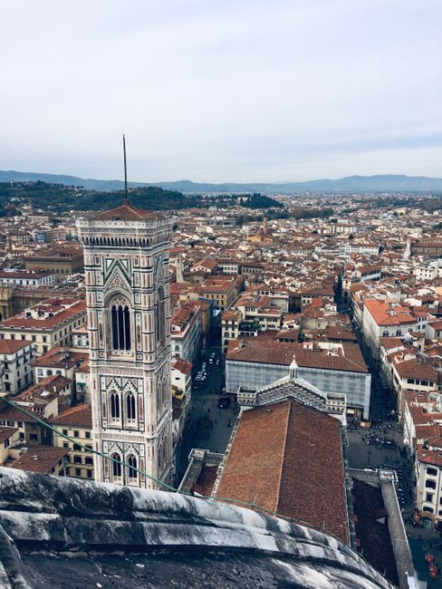 Stunning aerial view of Florence featuring Giotto's Campanile and cityscape.