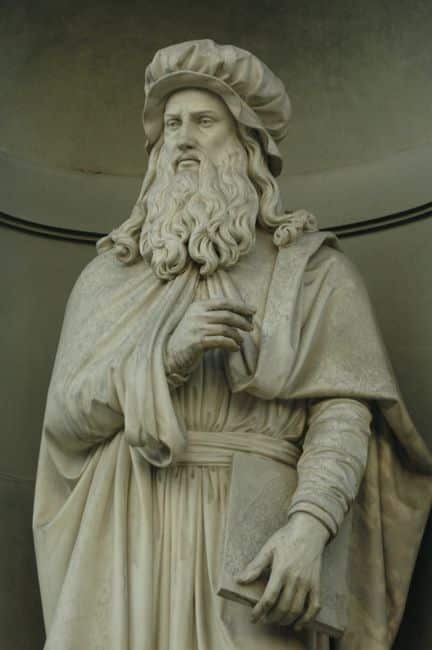 Elegant marble statue depicting a prominent Renaissance figure.