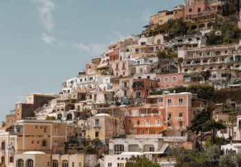 Picturesque cliffside view of colorful Positano, Campania, Italy, showcasing iconic architecture.
