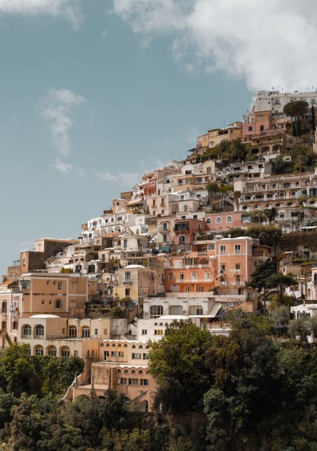Picturesque cliffside view of colorful Positano, Campania, Italy, showcasing iconic architecture.