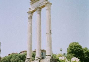 Ruins of the Temple of Castor and Pollux in bright summer Rome, Italy.
