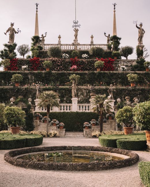 Explore the ornate garden of Palazzo Borromeo on Isola Bella, a serene oasis on Lake Maggiore.