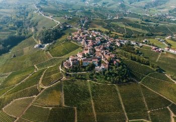 Stunning aerial view of Castiglione Falletto town and vineyards in Piedmont, Italy.
