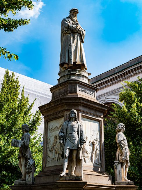 Statue of Leonardo da Vinci with four disciples in Milan, Italy.