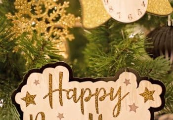 Close-up of a beautiful New Year sign with festive Christmas decorations.
