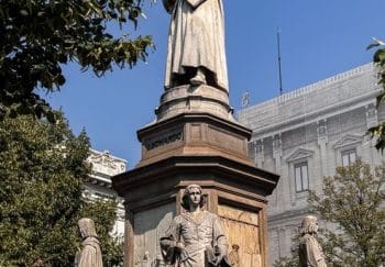 Statue of Leonardo da Vinci at Piazza della Scala, Milan. Iconic Renaissance figure in historic setting.