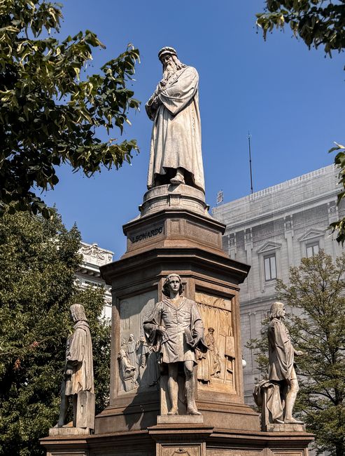 Statue of Leonardo da Vinci at Piazza della Scala, Milan. Iconic Renaissance figure in historic setting.