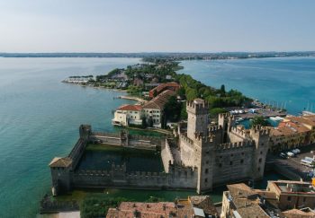 Aerial view of Scaligero Castle and Sirmione peninsula on Lake Garda, Italy.