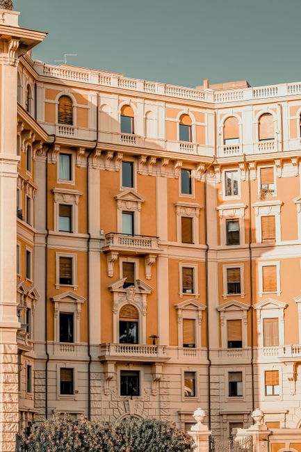 A striking example of Palladian architecture with ornate facades and arched windows in Rome, Italy.