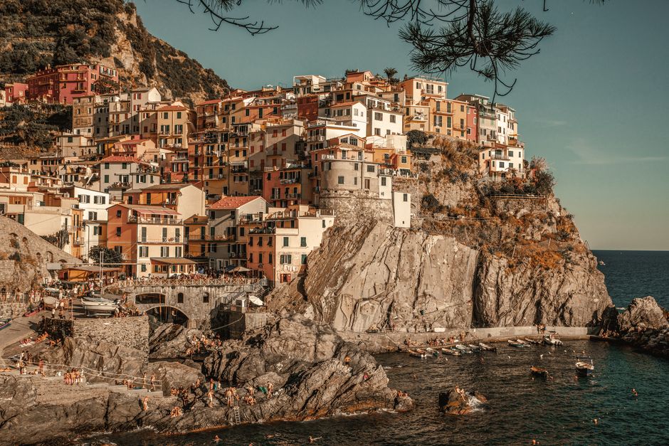 Charming colorful town on rugged cliffs by the sea in Cinque Terre, Italy.