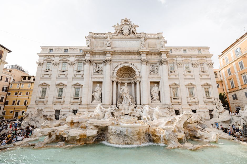 Explore the majestic Trevi Fountain in Rome, captured in stunning detail on a sunny day.