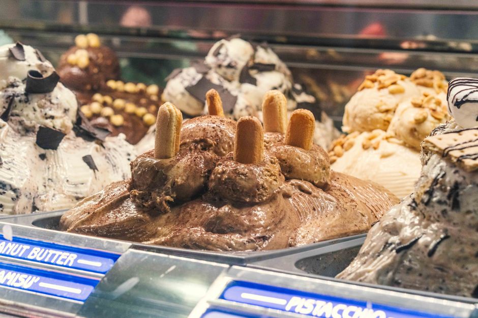 Close-up of colorful artisan gelato scoops in a Las Vegas cafe, showcasing a variety of flavors.
